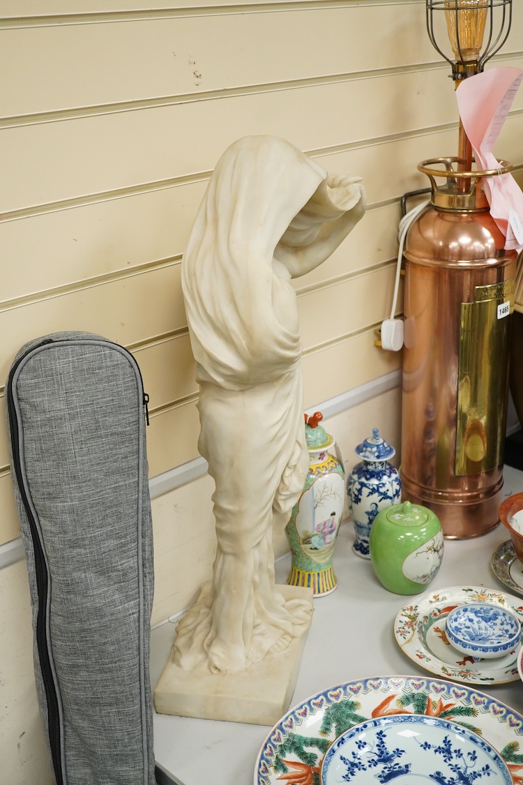 A large simulated marble statuette of a semi nude female, 73cm high